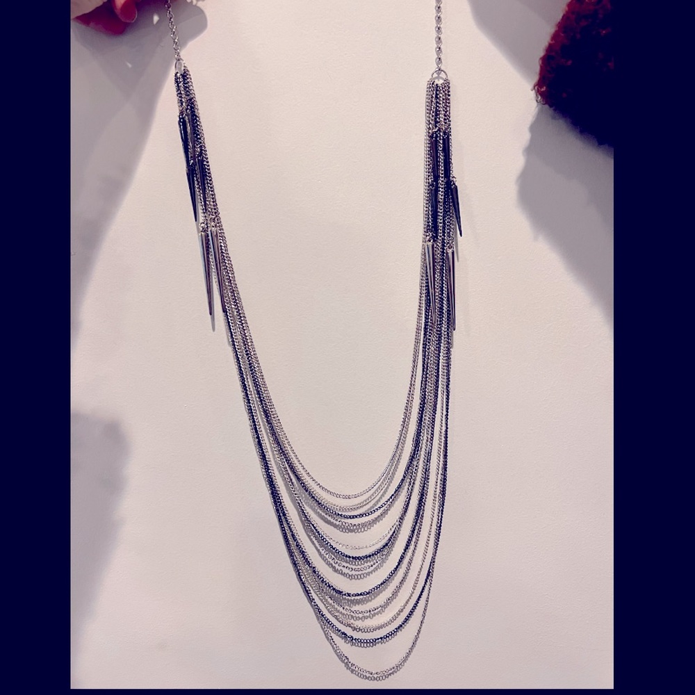 Draping chin necklace with spike details